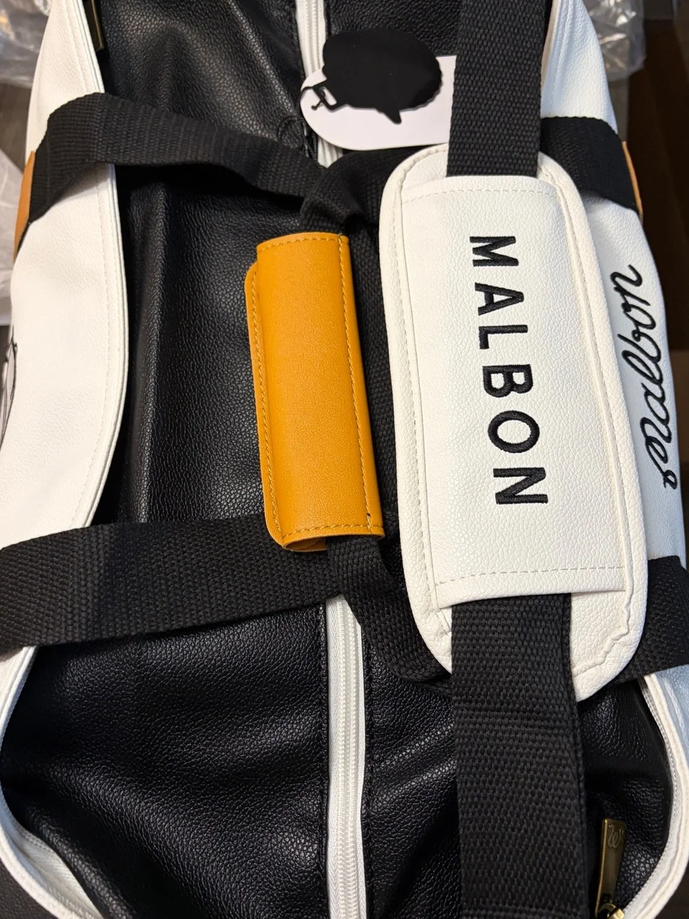 Malbon Duffel Bag Black, White, Brown.